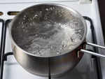 Making pakodas in boiling water