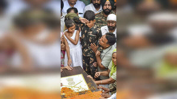 6-year-old son bids farewell