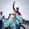 Bandh in Karnataka: Kiran Aradur from Piriyapatna protests with water bottles at Town Hall