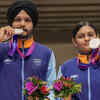 Silver medalist Indian shooters Sarabjot Singh and Divya Thadigol Subbaraju pose with the silver medal