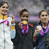 Parul and Priti pose with their sliver and bronze!