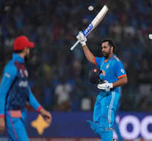 World Cup 2023 action in images: Rohit Sharma hits record WC century as India win by 8 wickets against Afghanistan