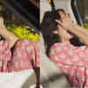 Article image for: Janhvi Kapoor giggles, hides her face as she gets clicked outside rumoured BF <i class="tbold">shikhar pahariya</i>'s houe