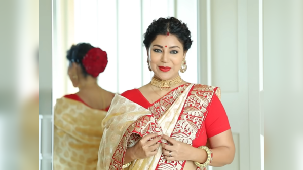 Lal par sada saree is a must being a Bengali