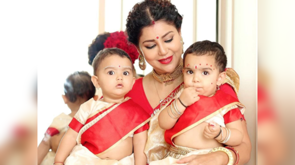 From getting Divisha and Lianna to wear authentic saree to reminiscing about pandal hopping; Debina Bonnerjee shares a glimpse of her Durga Puja celebration