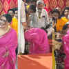 Article image for: Watch: <i class="tbold">Kajol</i> almost falls off stage, drops her phone at Durga Puja pandal