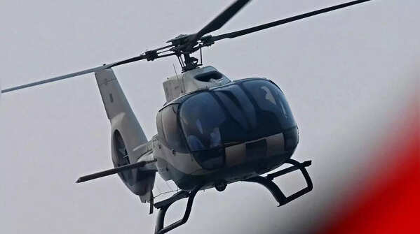 Nawaz Sharif arrives in helicopter.