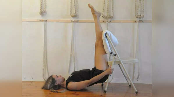 Urdhva Prasarita Padasana (legs up the wall pose)