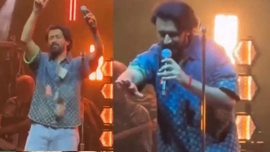 Pakistani singer Atif Aslam stops singing mid-way after a fan throws money at him during a concert
