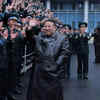 Workers enthusiastically cheered Kim and Ju Ae 