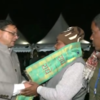 Uttarakhand CM Pushkar Singh Dhami felicitates the family members of a few of the 41 workers who are participating in the "Igas Bagwal" celebrations at his residence in Dehradun.