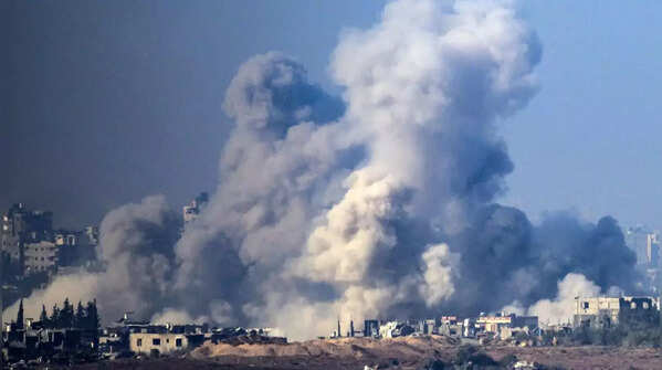 Smoke rises above buildings