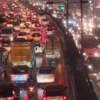 The traffic at Chrompet GST Road in Chennai as rain lashes the city.