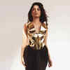 Tamannaah Bhatia looks like a golden goddess in a corset top and a chic black  skirt | Times of India