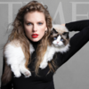 Taylor Swift sharing the spotlight with her cat