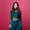 Article image for: <i class="tbold">raveena</i> Tandon raises the glam bar in a teal green dress
