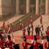 President Droupadi Murmu and French President Emmanuel Macron step outside the Rashtrapati Bhavan, as they leave for the Kartavya Path for Republic day. President Macron is attending the function as the chief guest this year.