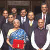 Article image for: 2024 <i class="tbold">interim budget</i>: Blue saree and bahi khata in her hand