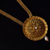 Long statement necklace with small jhumka earrings