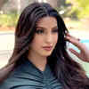 Nora Fatehi makes heads turn in a bodycon dark green midi dress with ruched  detailing | Times of India