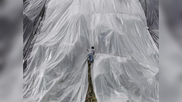 Residents fill sandbags as storm approaches