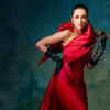 Malaika Arora commands attention in a dramatic red gown with black opera  gloves | Times of India