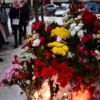 Navalny's open casket and family's lit candles