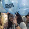 ​People hold balloons to mark 10 years of plane disappearance