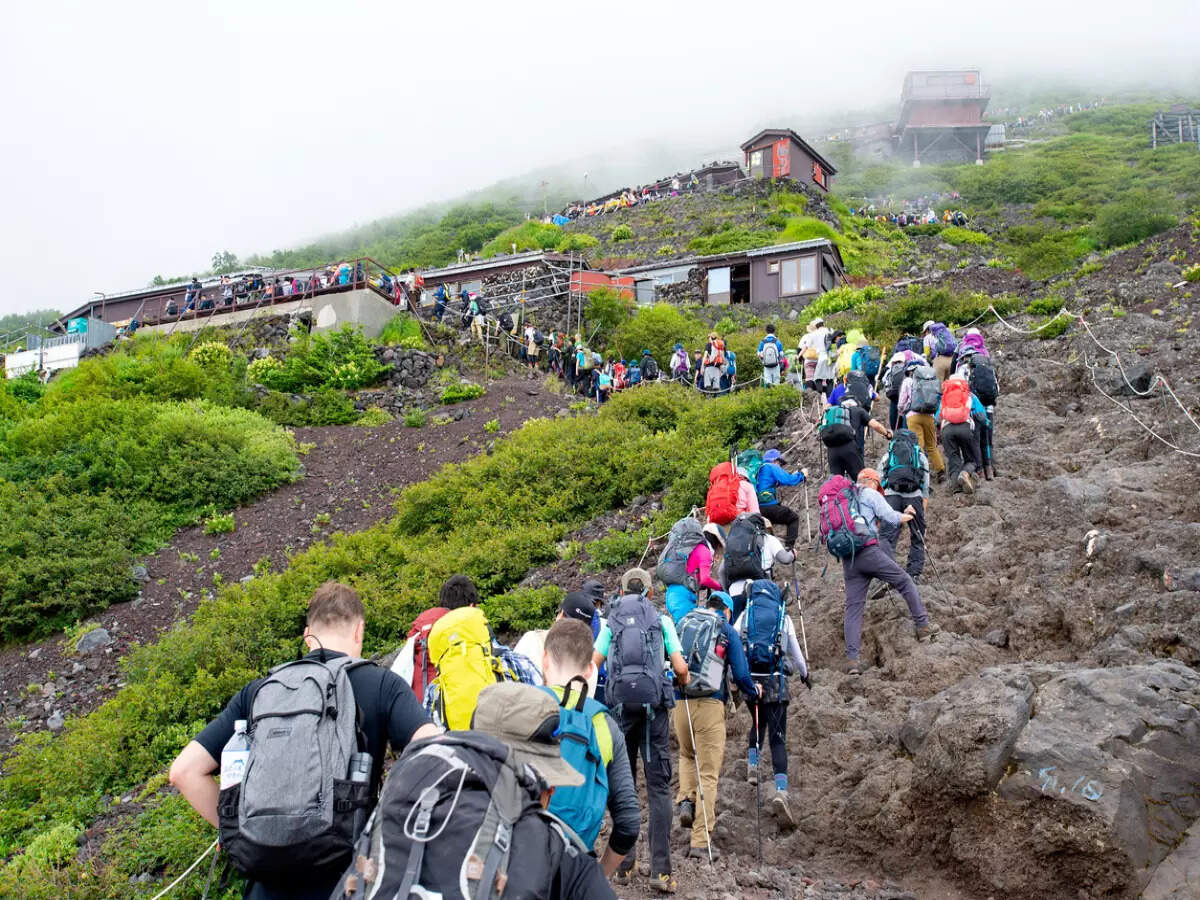 Japan: Mount Fuji imposes INR 1108 entry fee to tackle overtourism issues |  Times of India Travel