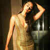 Pooja Hegde glitters in gold in an exquisite Zardosi bodycon dress | Times  of India