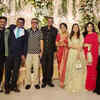 Posing with the business honchos