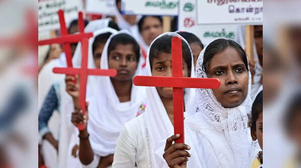 Devotees perform re-enactment of crucifixion of Jesus in Chennai