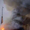 Spire collapses as fire engulfs stock building 