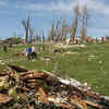 Cleanup begins after widespread devastation