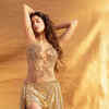 Janhvi Kapoor shimmers and shines in a sheer golden bodysuit and skirt