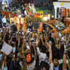 Public chant slogans, shower flowers
