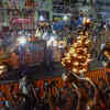 Supporters perform aarti