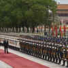 Putin welcomed by military music