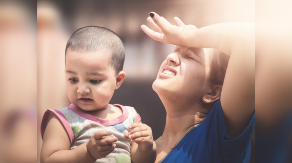 What are the warning signs of heat stroke?
