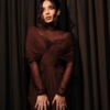 Article image for: Stunning in a Brown Bodycon Dress for Night Manager 2 Promotions