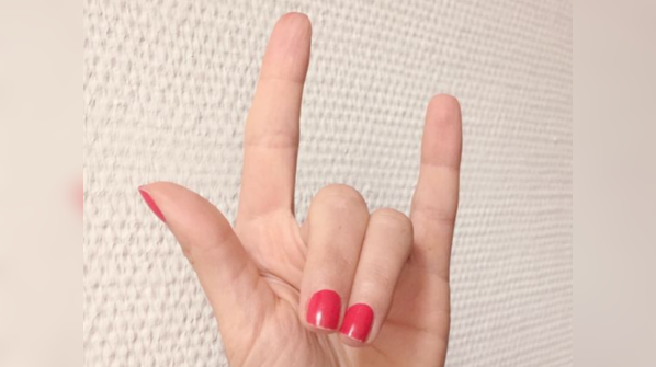 The gap between middle finger and ring finger