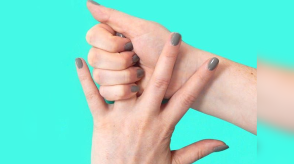 The gap between ring finger and the little finger