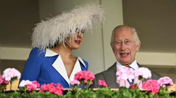 Camilla dazzles in blue, Charles elegantly formal