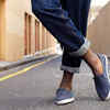 ​Standing with legs crossed