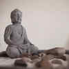 A sculpture or painting of Buddha 