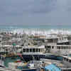 ​Fishing boats piled up at shore