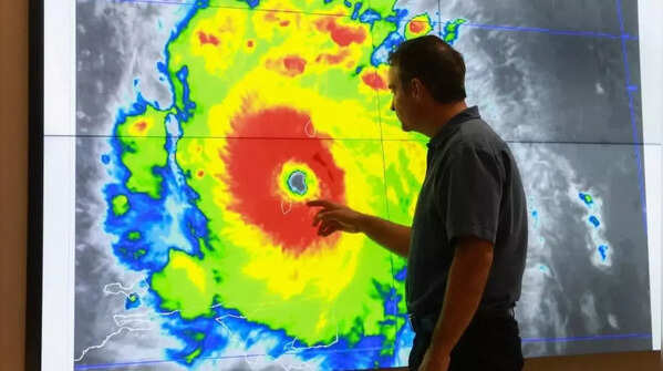Senior Hurricane Specialist at the National Hurricane Center in Miami, Florida.