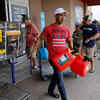 People stock up on essential supplies 