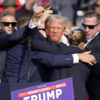 Cheers follow Trump's gesture