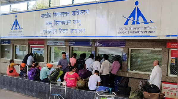 People queued outside airline ticket offices in Jammu